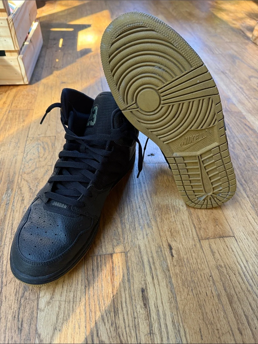 Jordan Black High-Top Sneakers with Metallic Accents